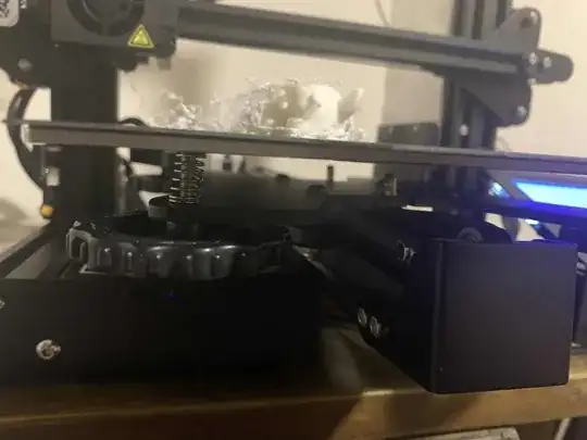 Photo of a model printed halfway through with 'spaghetti' but from the side