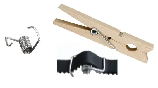 Clothpin springs repurposed into a makeshift belt tensioner