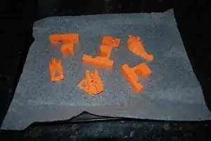 Failed 3D prints on a baking tray Failed 3D prints on a baking tray