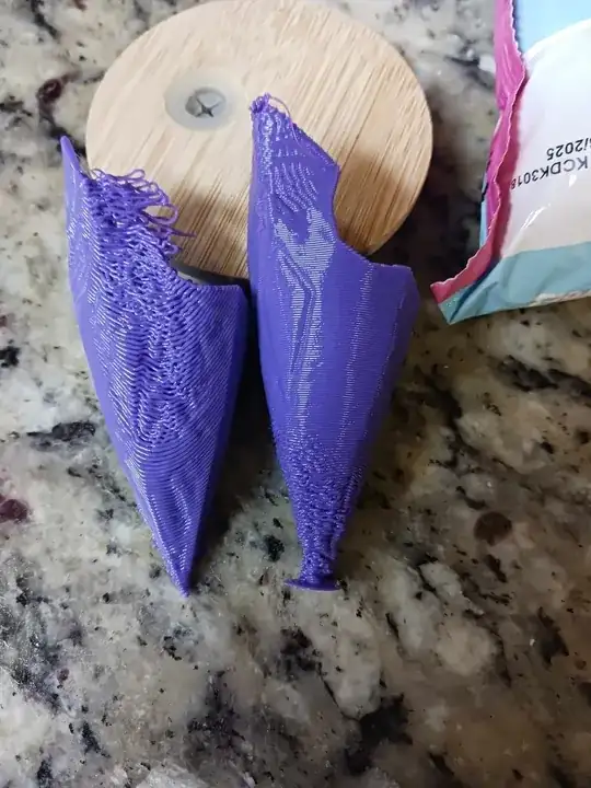 Photo of two identical models with layers not adhering or poorly extruded Photo of two identical models with layers not adhering or poorly extruded