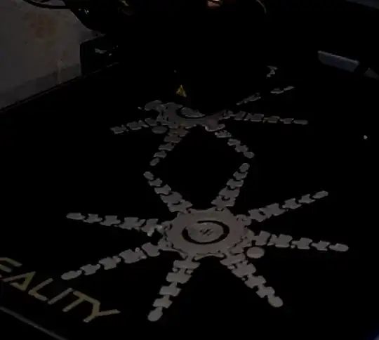 Photo of the first few layers of a printed model with edges curling up Photo of the first few layers of a printed model with edges curling up