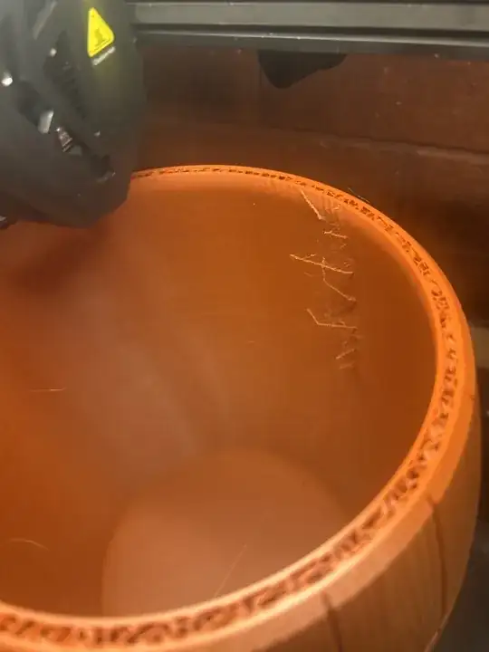 tendrils emerging from the inside wall of a 3D printed barrel