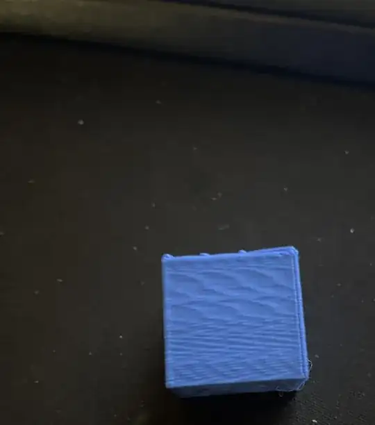 Photo of a calibration cube with irregularities on the surfaces Photo of a calibration cube with irregularities on the surfaces